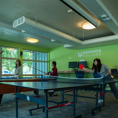 students playing table tennis
