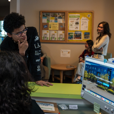 students in the housing office