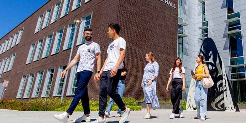 Students walking near Hazel Miller Hall