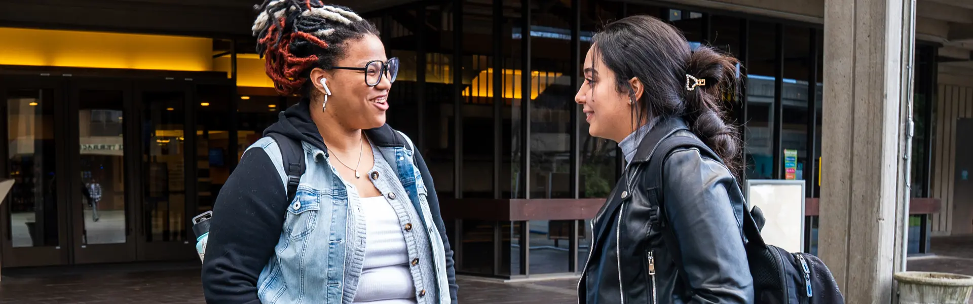 Students talking on campus near Lynnwood Hall